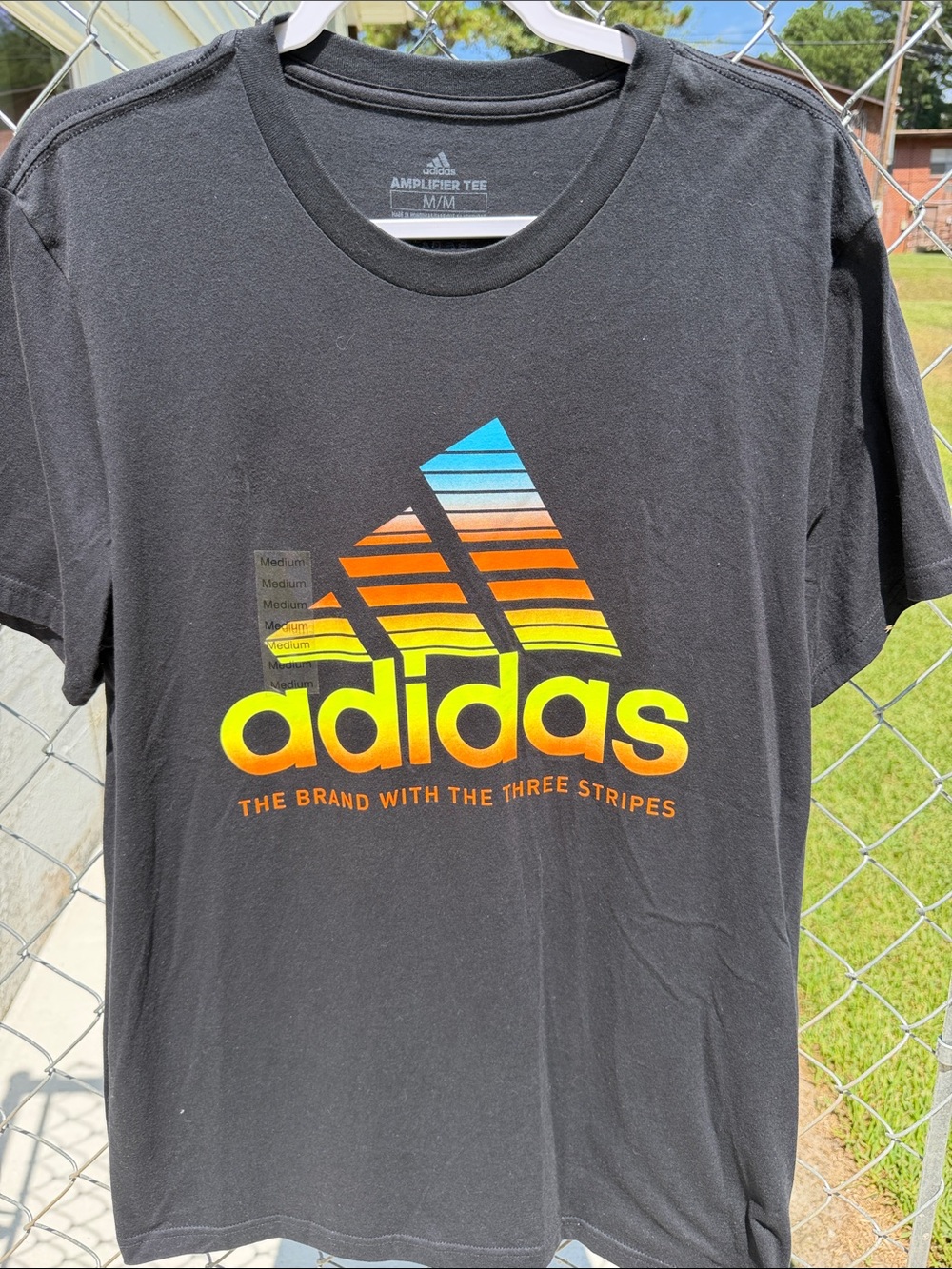 adidas Black Tee with Blue-Orange-Yellow Gradient Logo